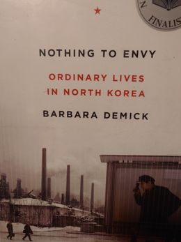 book cover of Nothing to Envy by Barbara Demick