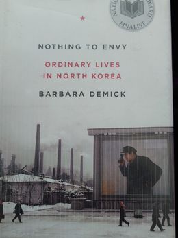 book cover of Nothing to Envy by Barbara Demick